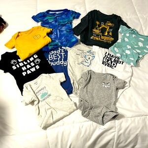 Lot of 10 12M infant onesies. Carters,jumping beans, cat and jack